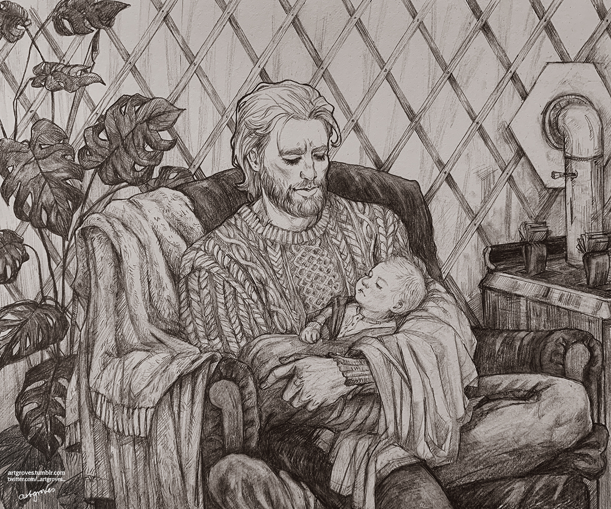image of Steve sitting in a comfortable armchair in a yurt holding a small baby with light-coloured hair